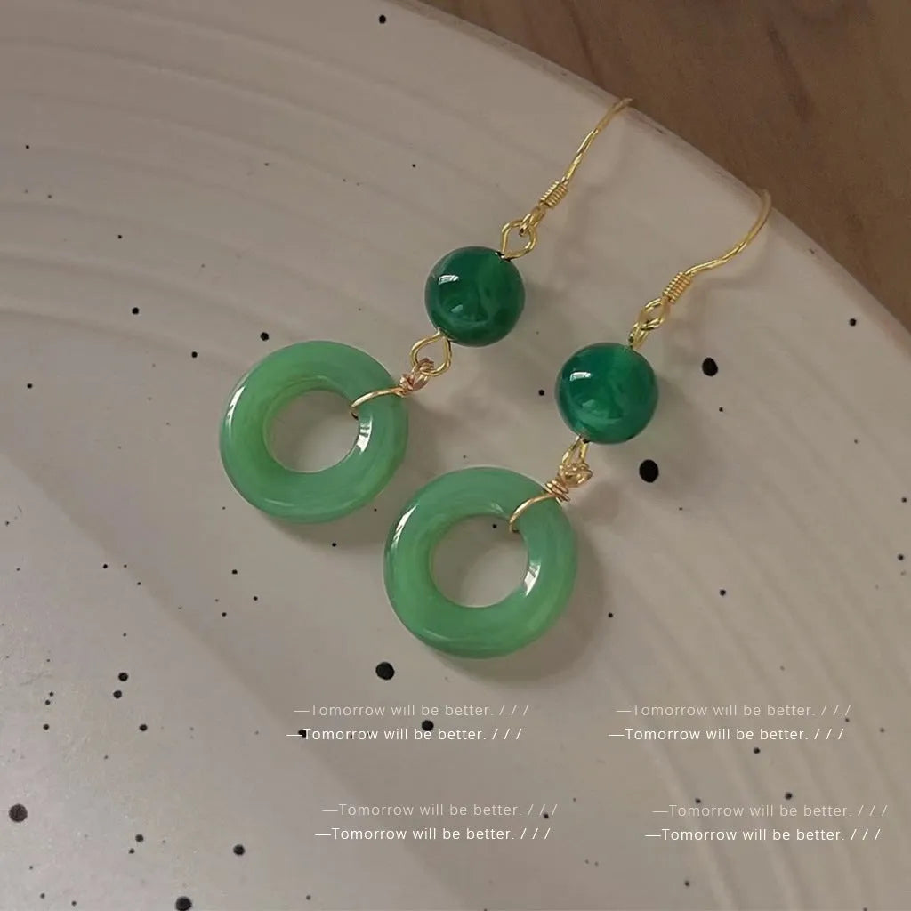 Geometric Chinese peace buckle earrings with green jade design on zinc alloy