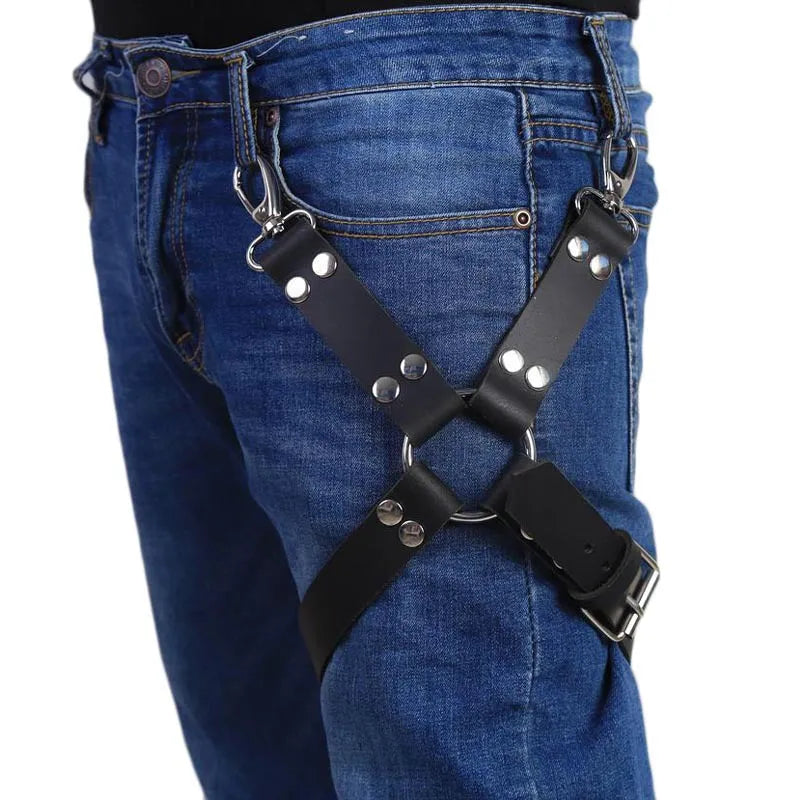 Black PU leather women's leggings on a hanger.