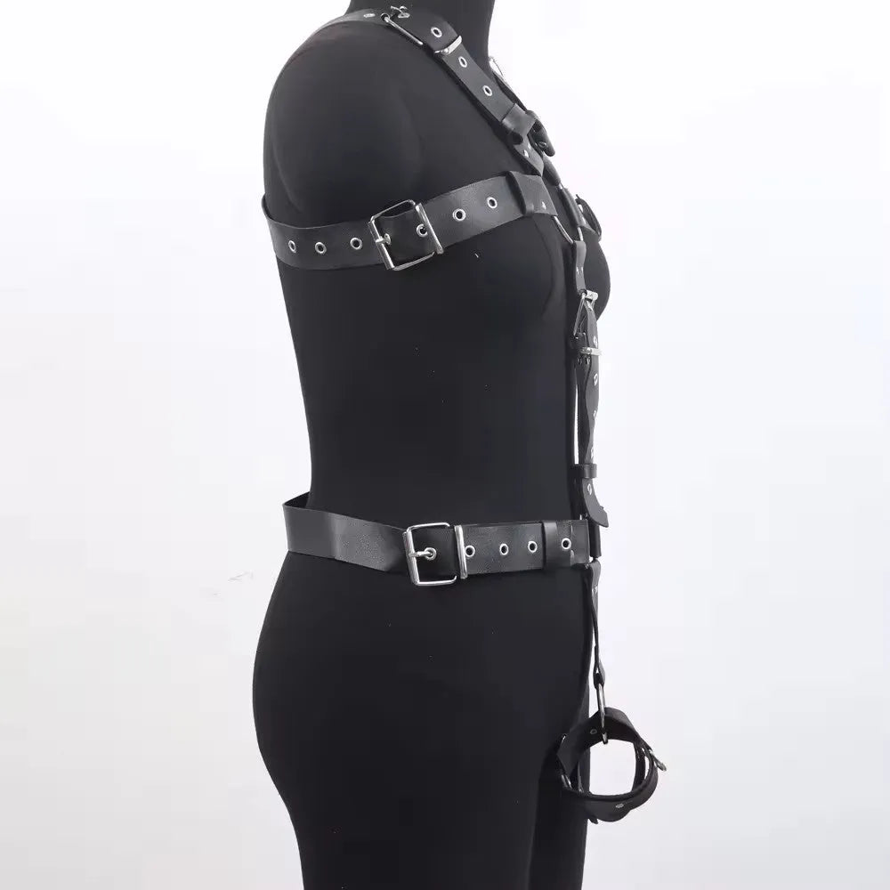 Black patent leather waist cincher shapewear with pin buckle fastening on mannequin
