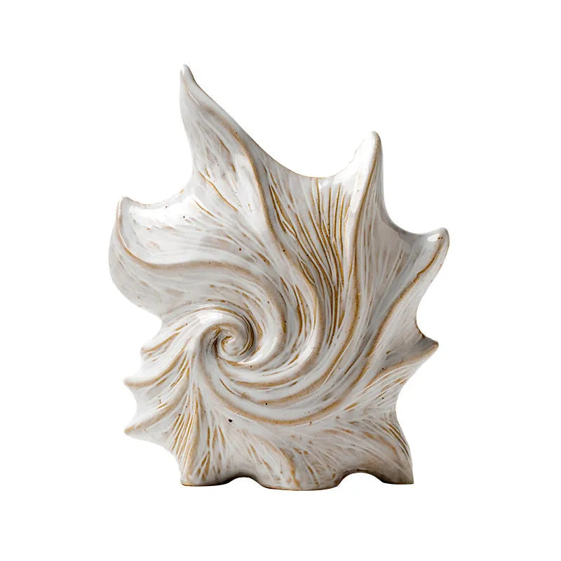 French art style ceramic vase with coloured glaze finish on a table