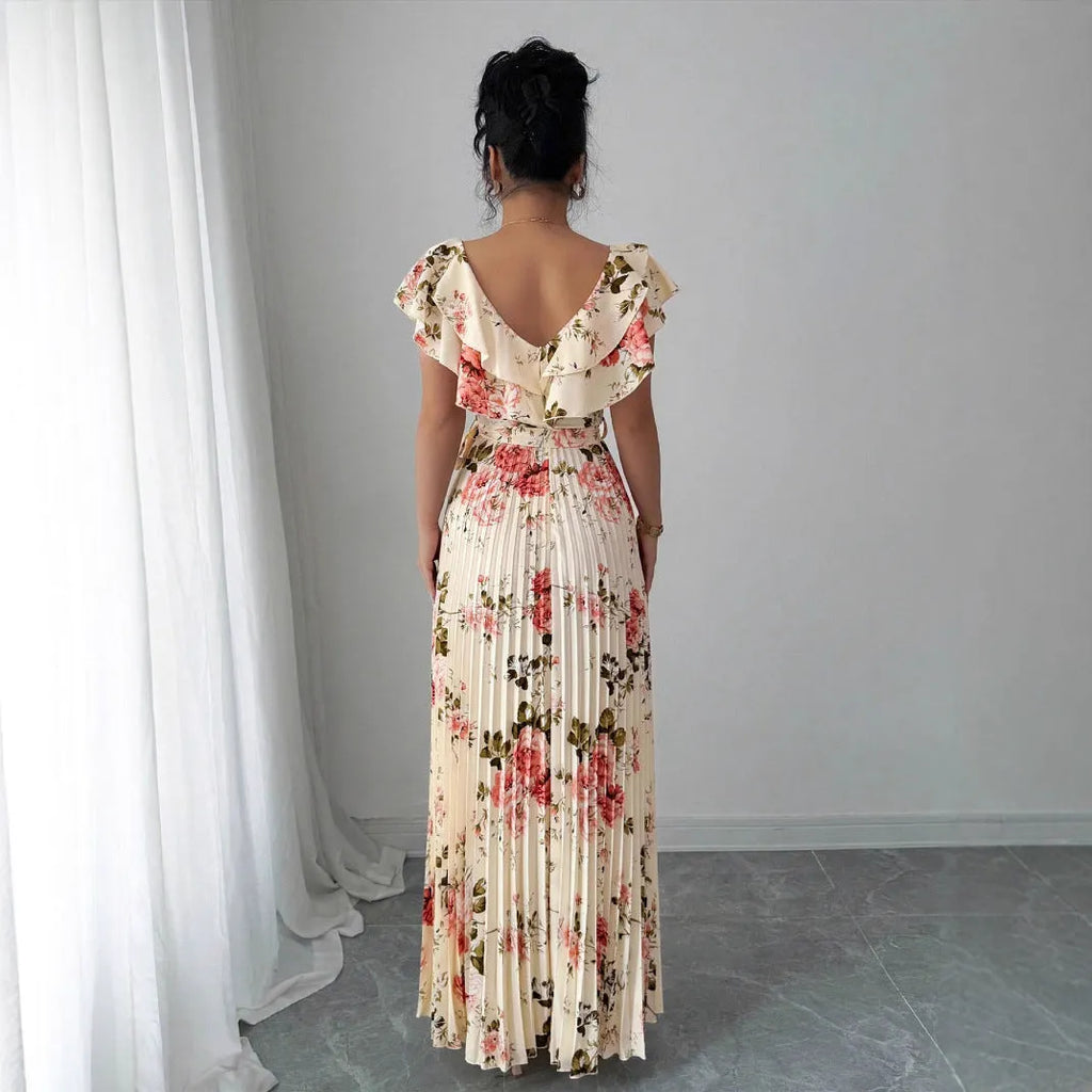 Apricot floral print V-neck dress with ruffled sleeves and oversized swing skirt on hanger