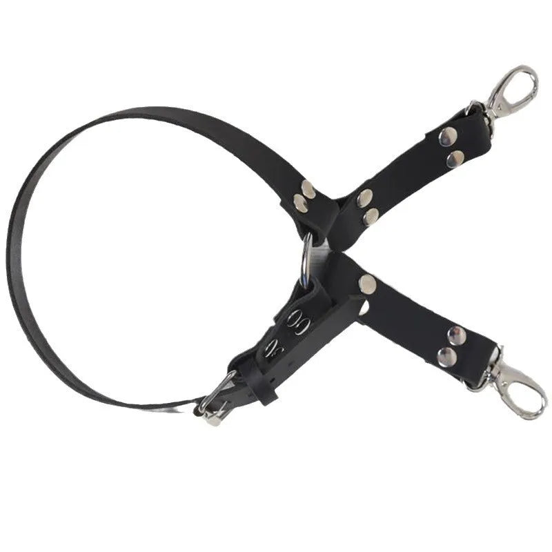 Black PU leather women's leggings on a hanger.