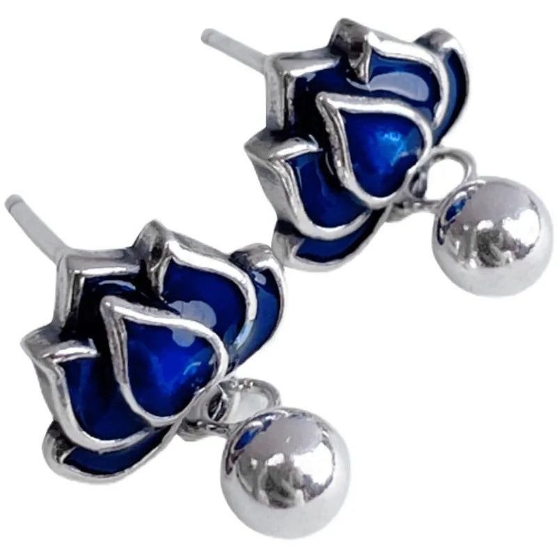 Blue lotus earrings with retro seedpod tassels measuring 1.2cm wide