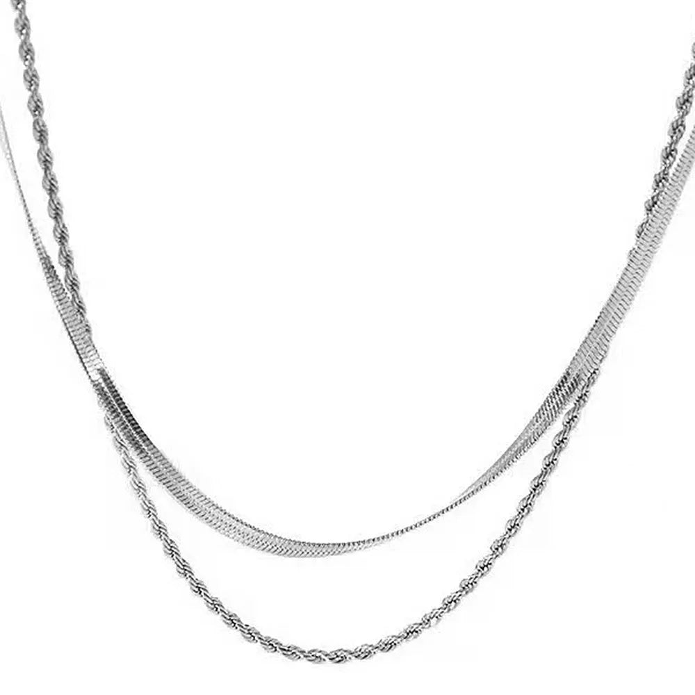 Retro double layer twist necklace with geometric titanium steel pendant on an adjustable snake chain.