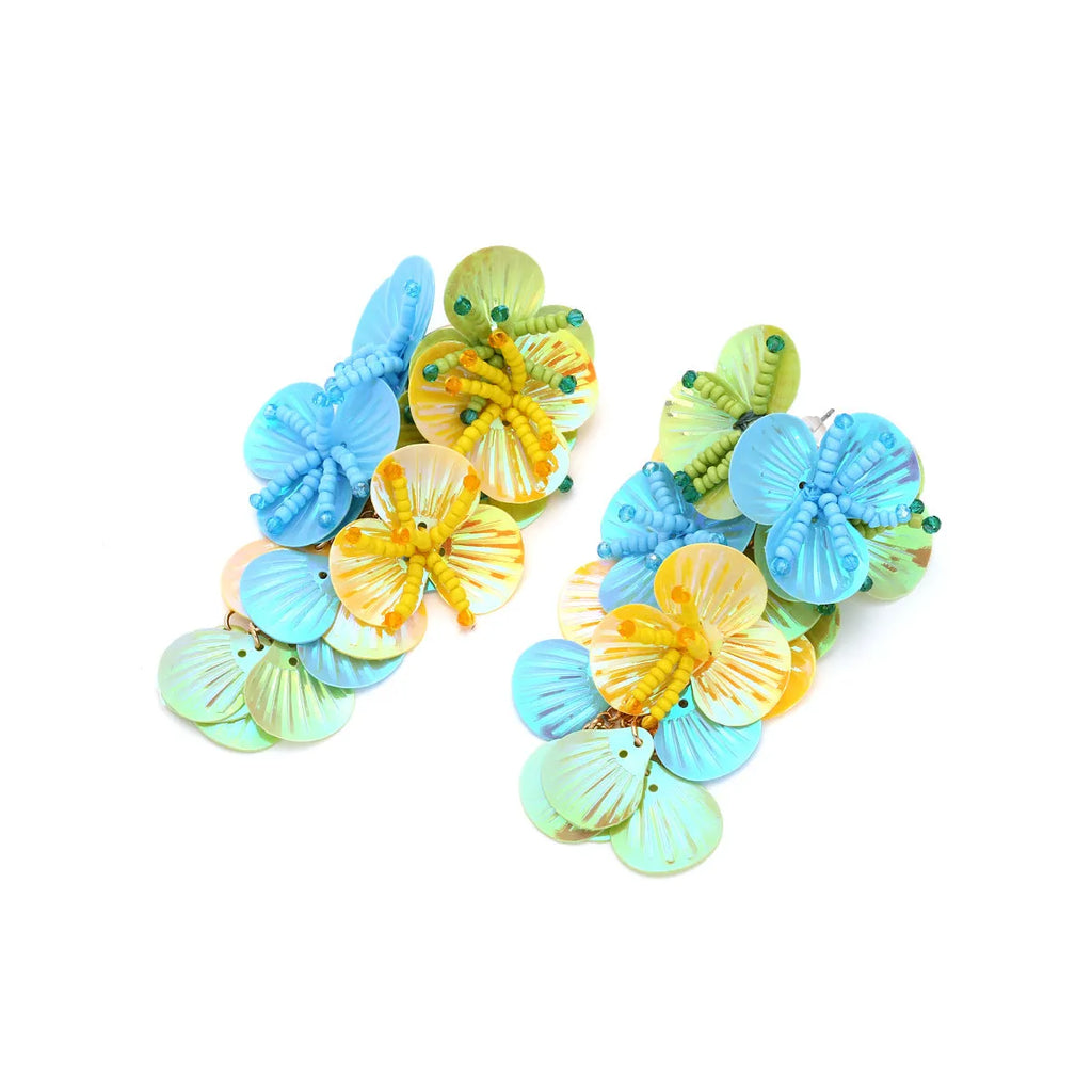 Handmade multicoloured string bead flower and leaf earrings in exaggerated dopamine style.