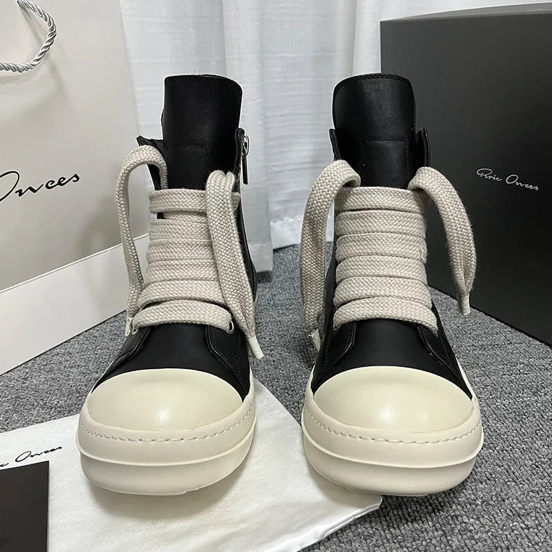 Black genuine cowhide leather high-top sneakers with a side zipper and platform sole.