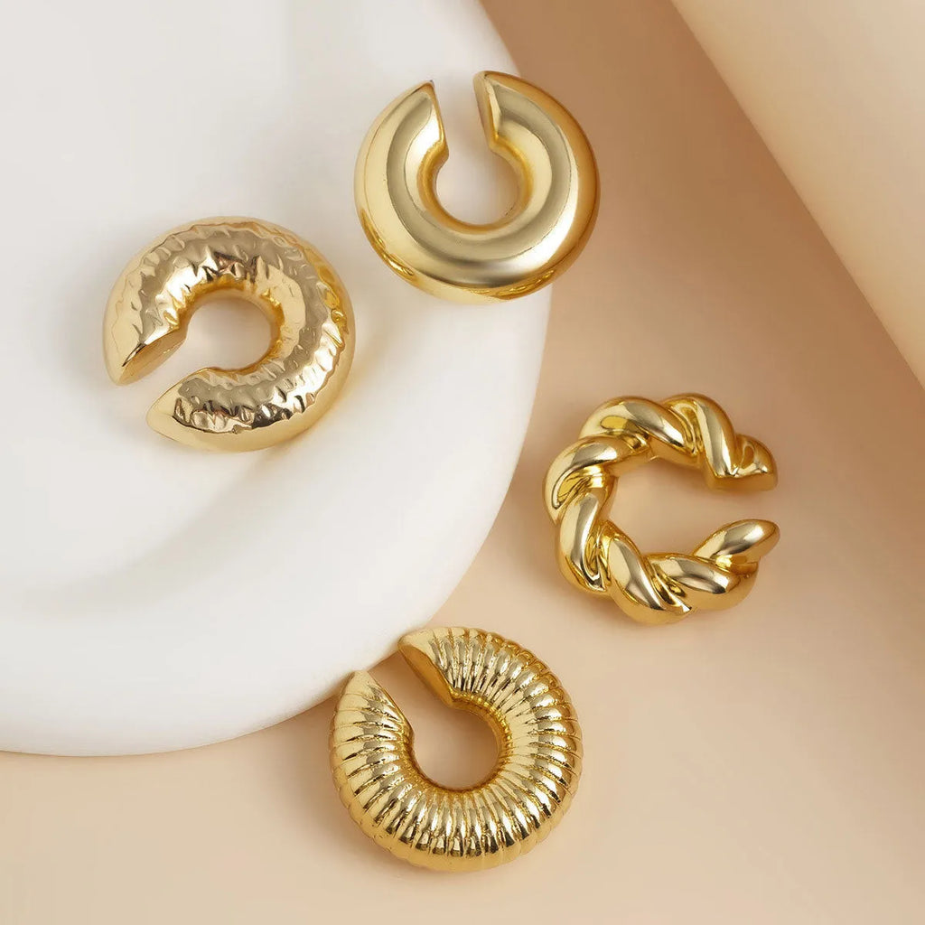 Set of four geometric clip-on earrings for women in gold and silver CCB alloy.
