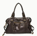Women's French retro motorcycle style messenger shoulder bag in soft PU leather with woven detailing