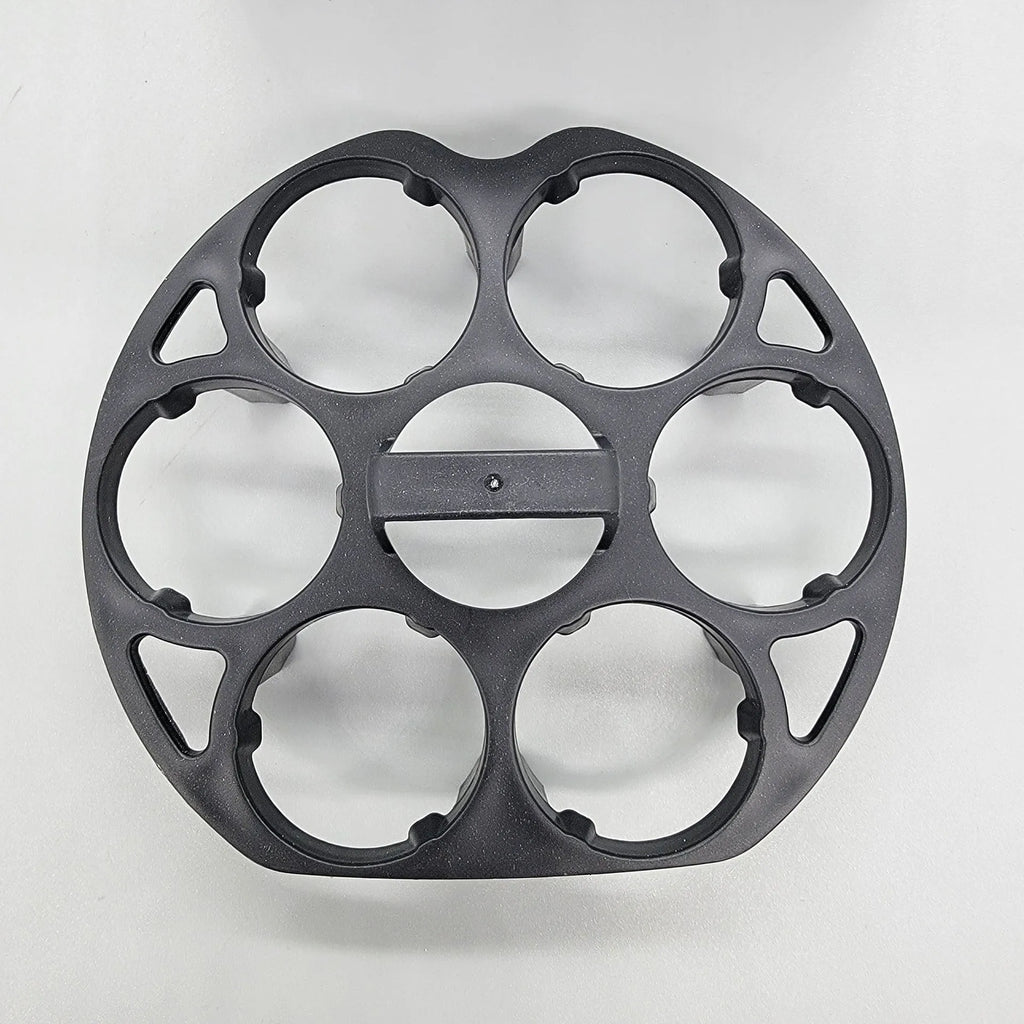 Black plastic egg holder basket for kitchen storage on a white background.