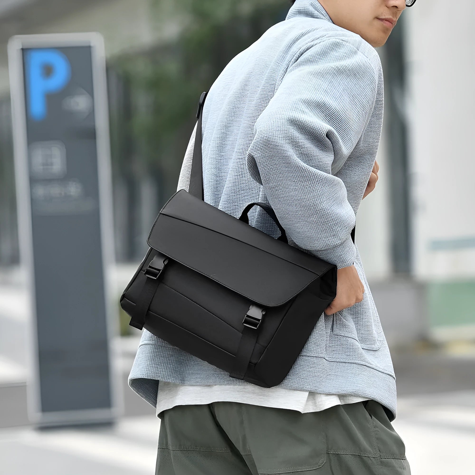 Men's black shoulder bag with large capacity, Derm material, visible sewing line detail, urban simplicity style