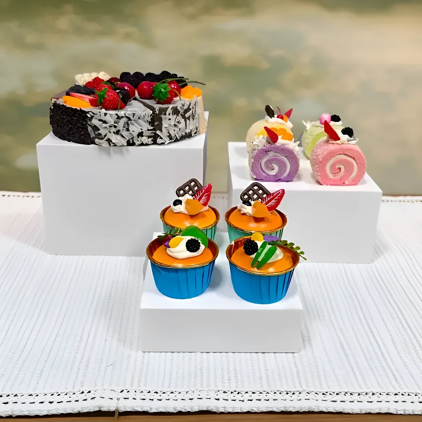 White plastic suit cube dessert display stand set with six tiered racks for bakery counter.
