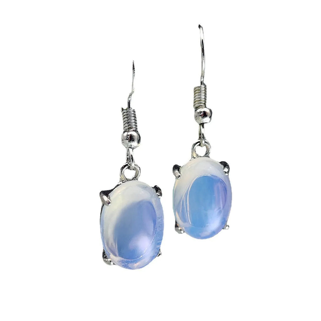Women's opal earrings with drop shape design in moonlight white colour featuring cross element