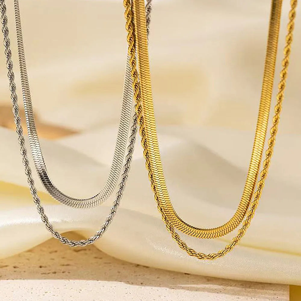 Retro double layer twist necklace with geometric titanium steel pendant on an adjustable snake chain.