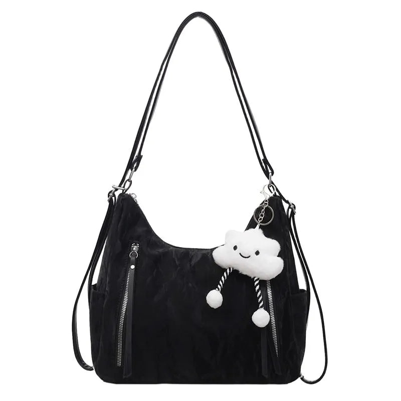Women's soft PU fashion backpack with pendant accessory in beige, black, blue, and silver colour options