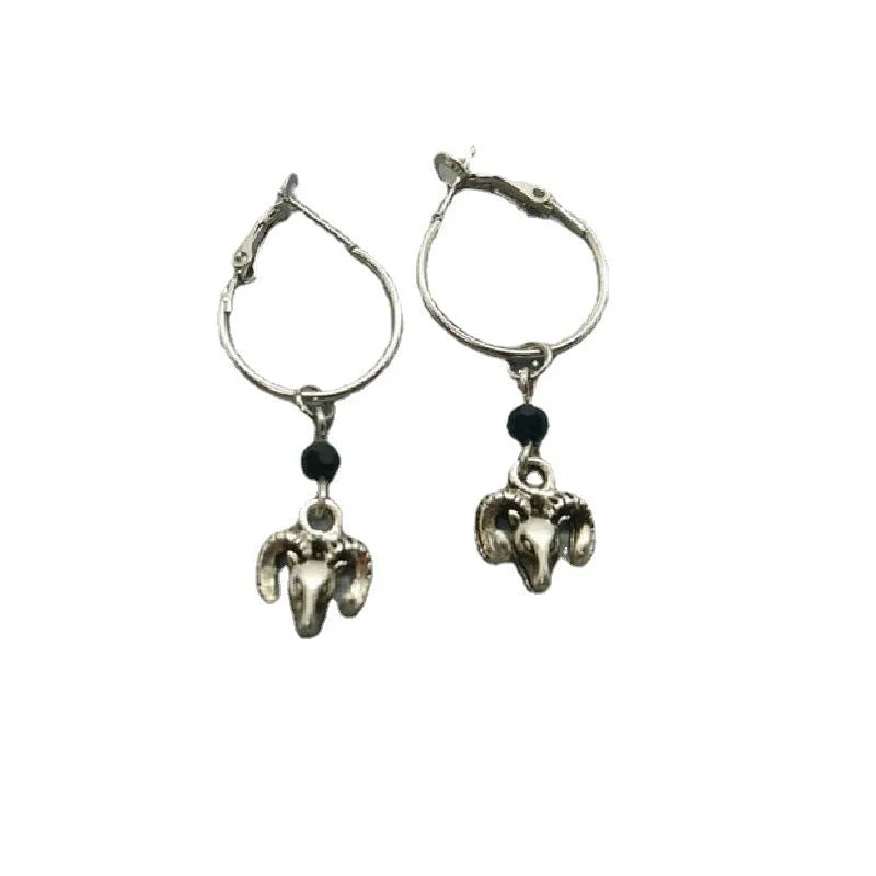 Silver colour round ring earrings with Tibetan antelope style decoration
