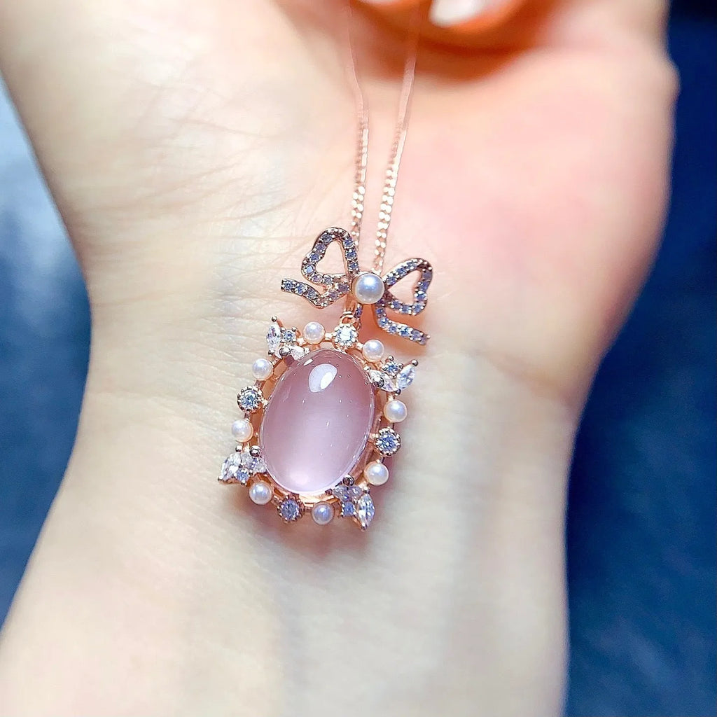 Geometric rose quartz pendant on 925 sterling silver chain with rose gold plating accents