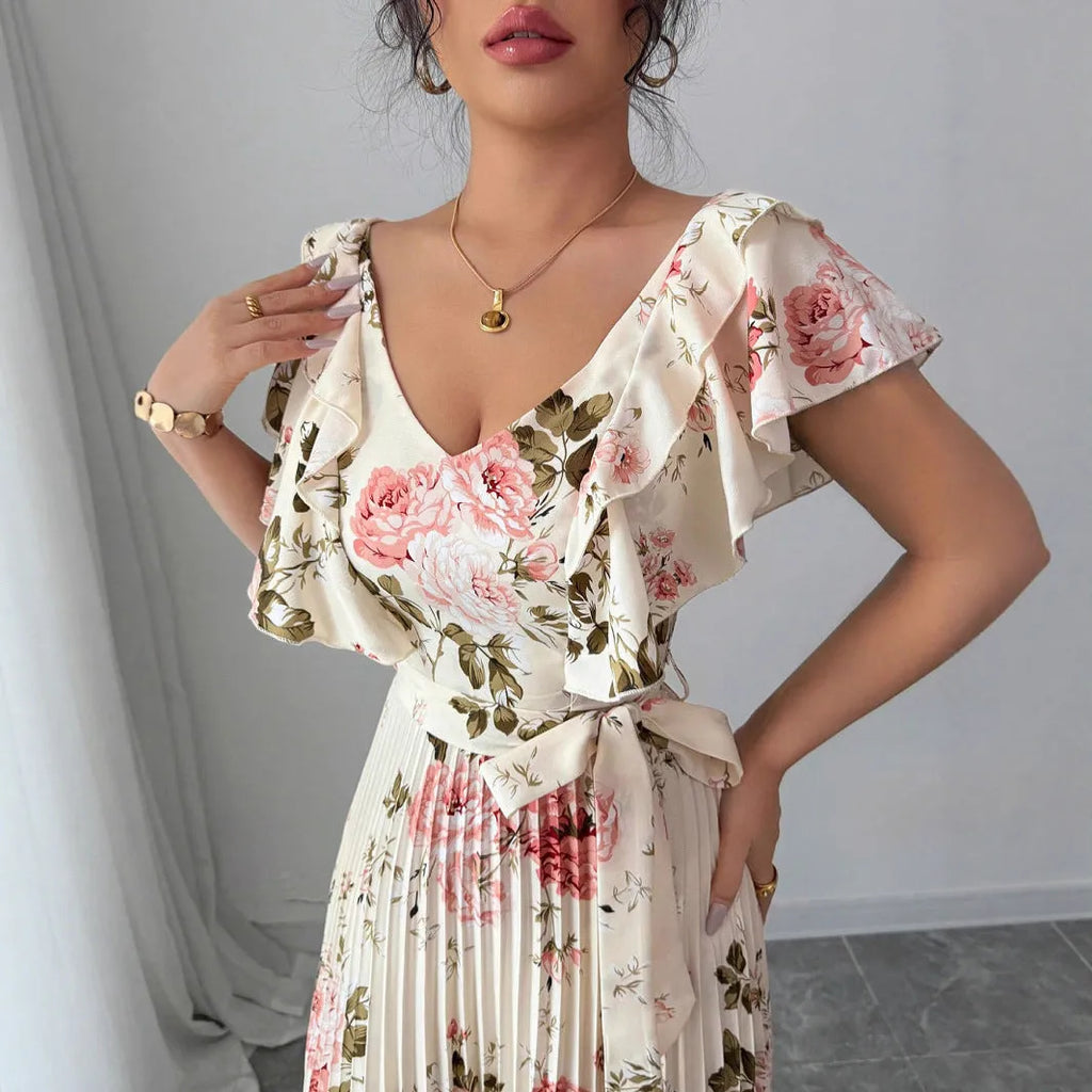 Apricot floral print V-neck dress with ruffled sleeves and oversized swing skirt on hanger