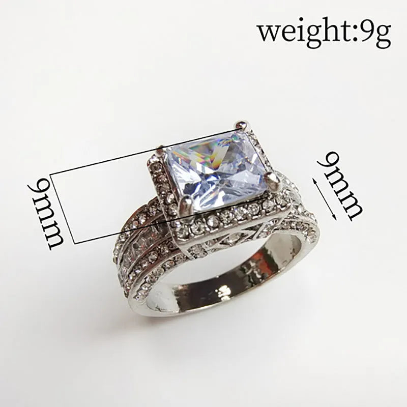Silver plated geometric fashion ring for women in gold or white colour with round elements