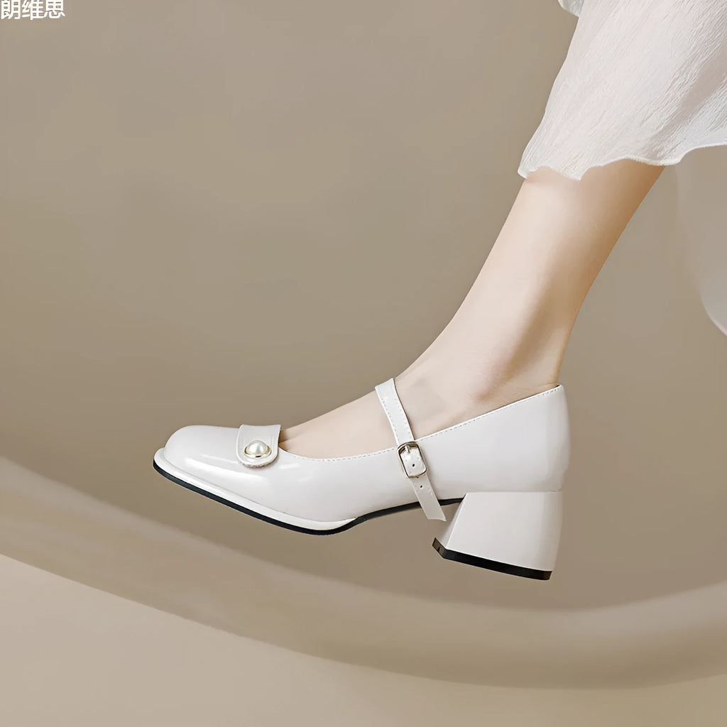 French style women's chunky heel pumps in patent leather with buckle fastening