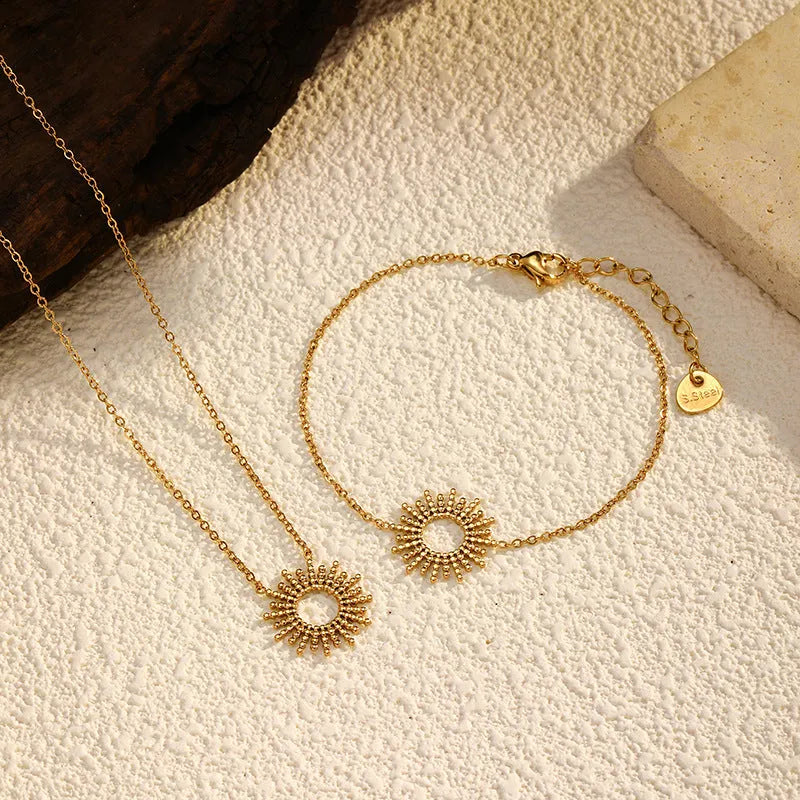 Sunflower series women's gold jewellery set showing necklace and bracelet with geometric chain design