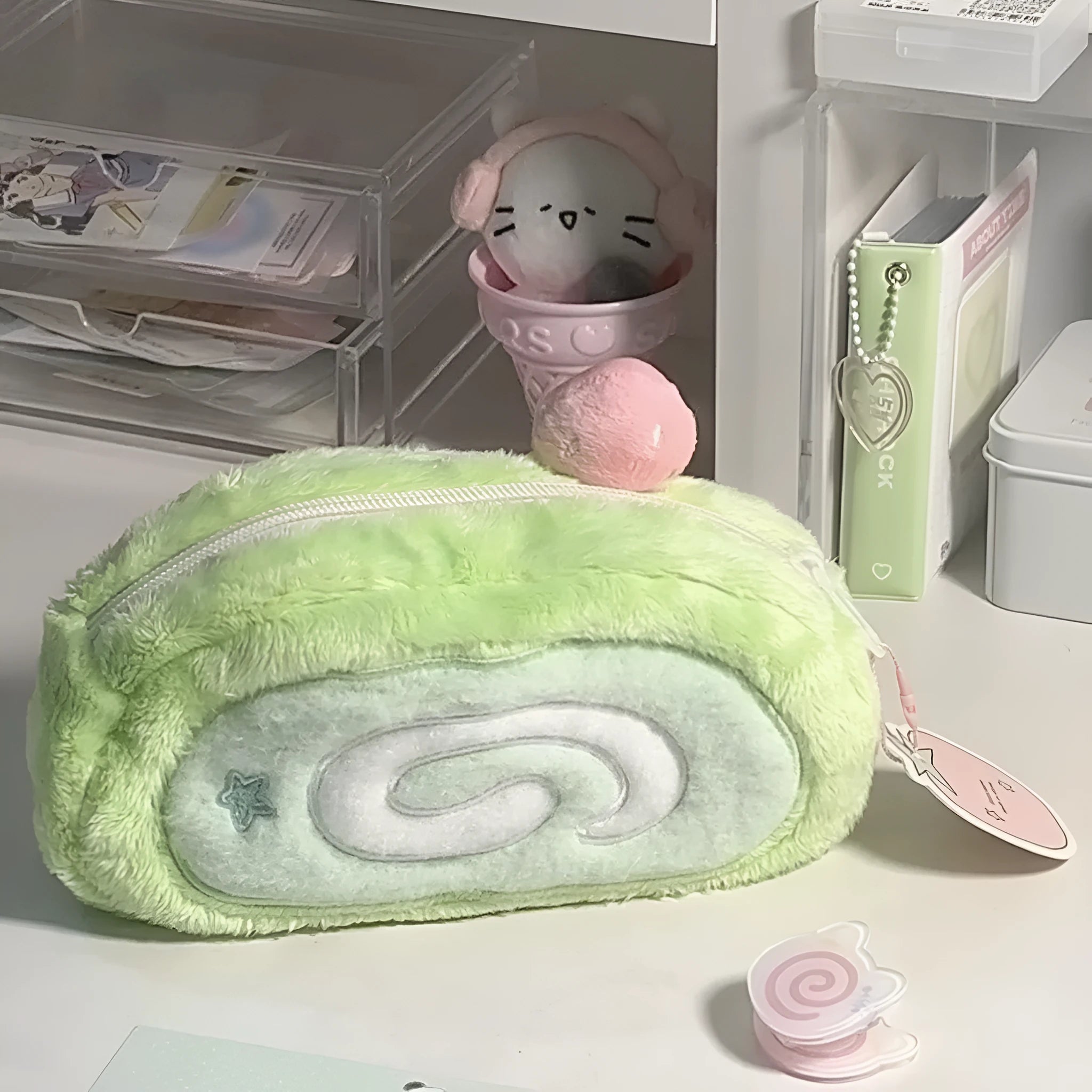 Honeydew coloured velvet pencil case with a Swiss roll cake design print.