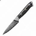 Damascus steel kitchen knife set with eight blades including Japanese and boning knives on a wooden surface