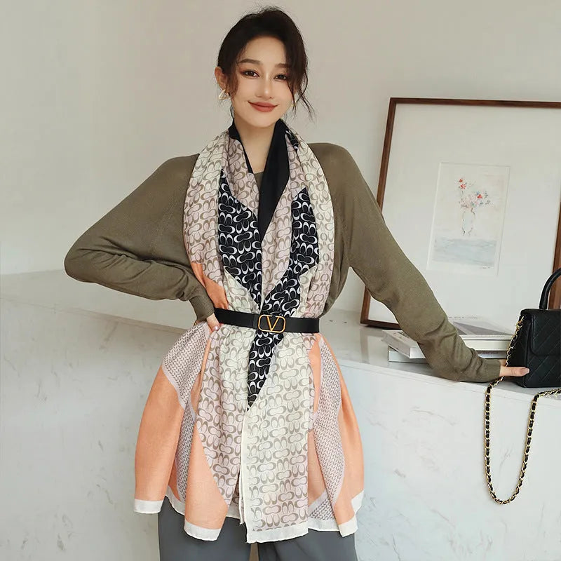 Polyester printed scarf shawl showing 90cm by 180cm dimensions and autumn-appropriate designs