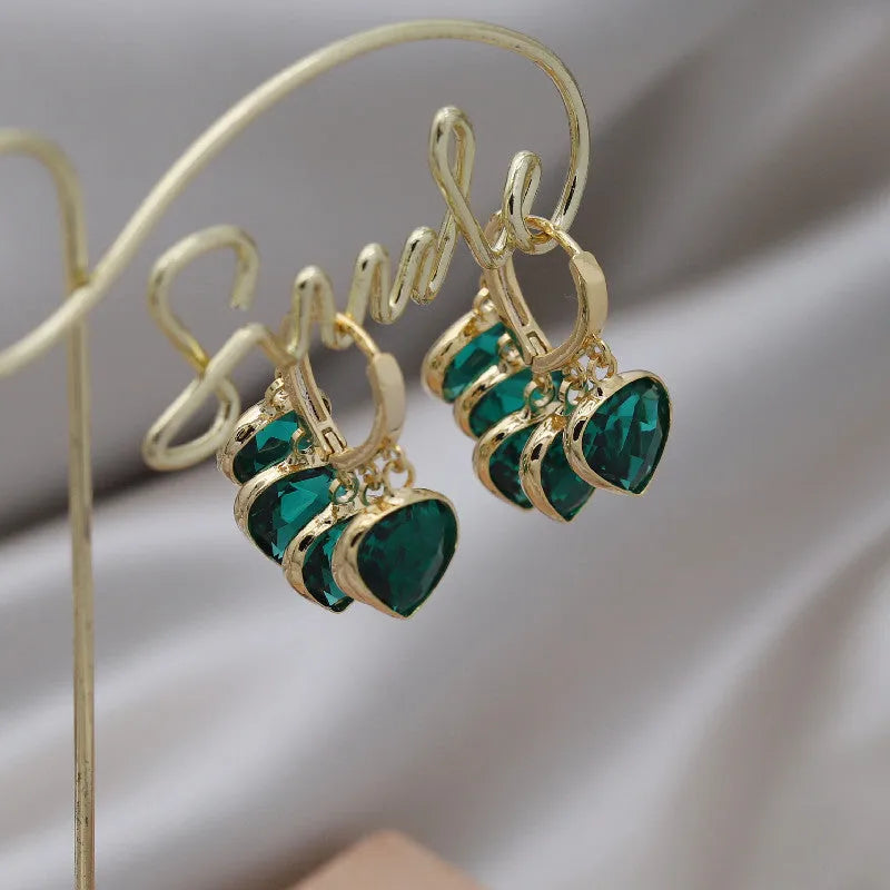Green heart pendant ear clip earrings with Korean style design and alloy inlay artificial gemstone details