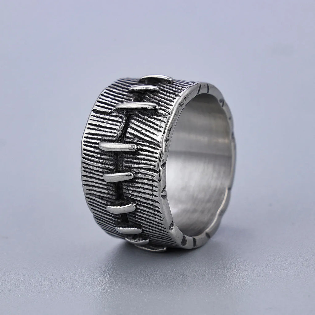Dark punk titanium steel double ring with geometric U-shape design in retro colour on size guide background
