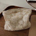 Handmade corduroy cosmetic bag with crocheted hollow flowers and ethnic embroidery in solid rope colour