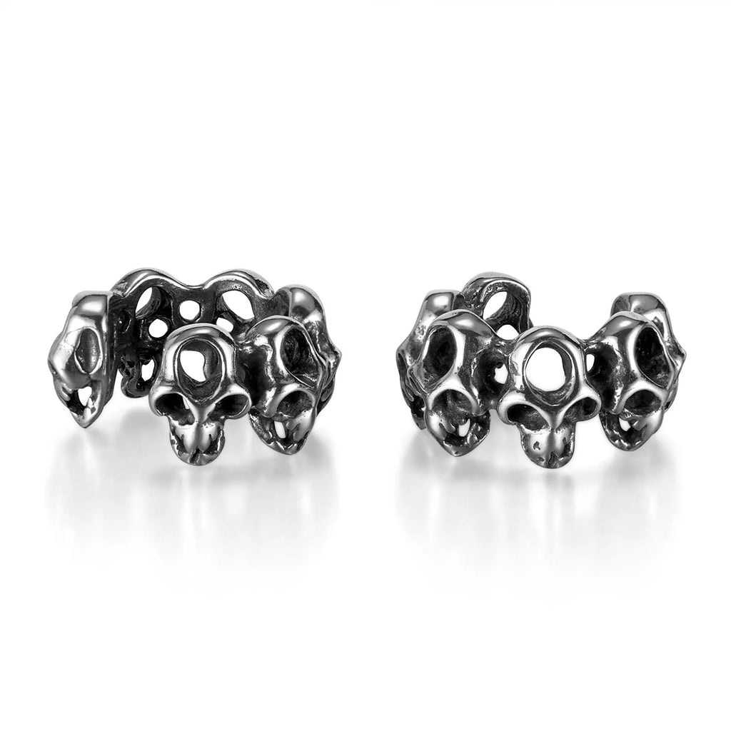 Stainless steel hollow skull earrings with electroplated finish and geometric design
