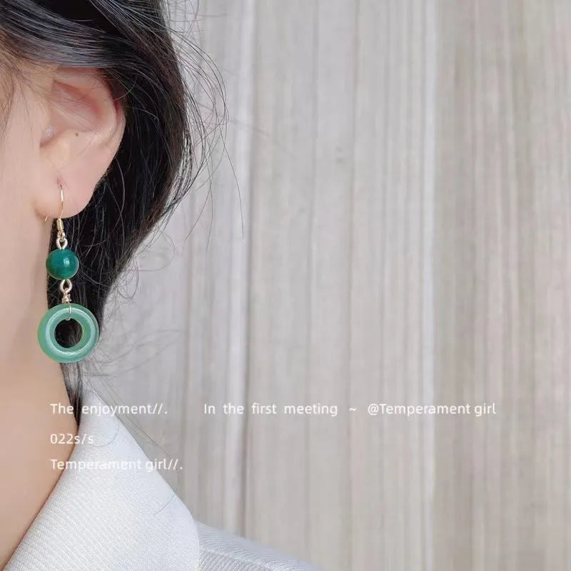 Geometric Chinese peace buckle earrings with green jade design on zinc alloy