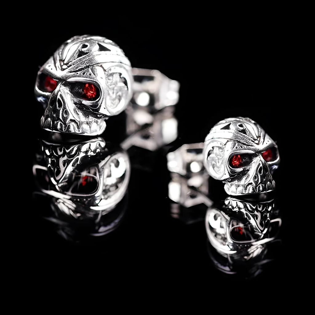 Retro style skull stud earrings with red eye ghost head design on alloy backing