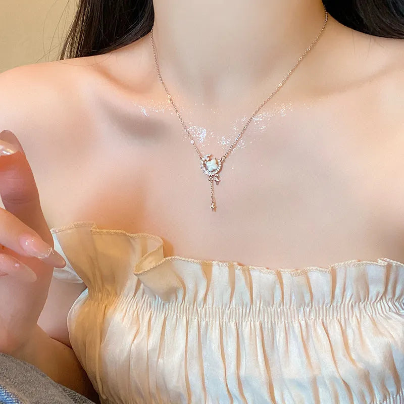 Gold and silver star moon necklace with zirconium diamonds on adjustable clavicle chain