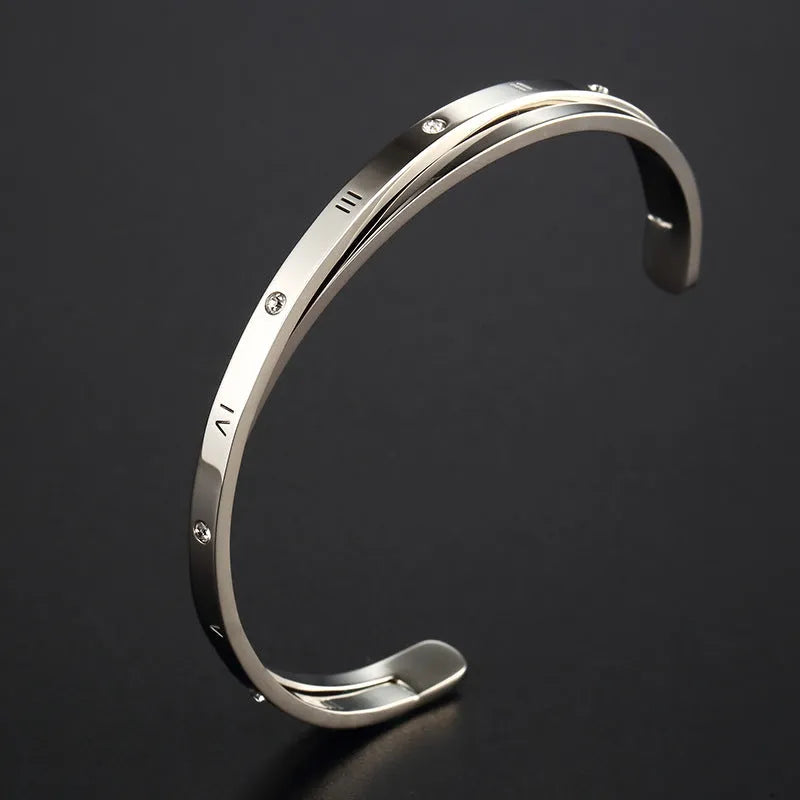 Open-ended stainless steel ladies bracelet with zircon stones in gold, rose gold, or steel colour options