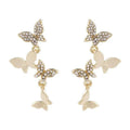 Gold colour copper butterfly drop earrings with four butterfly design elements