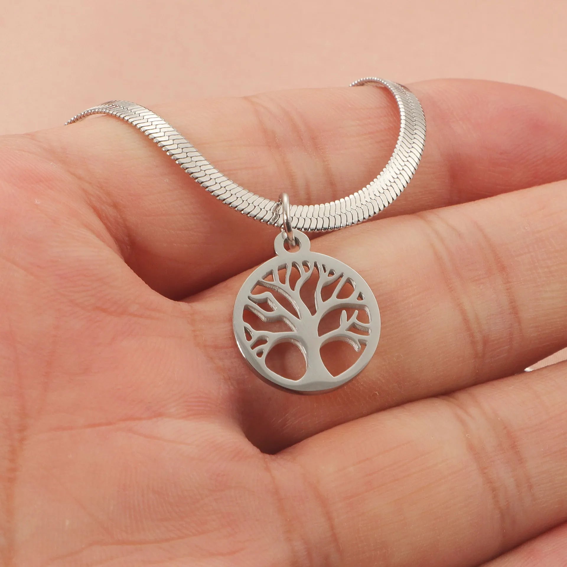 Stainless steel necklace with a U-shaped tree pendant on a snake bones chain.