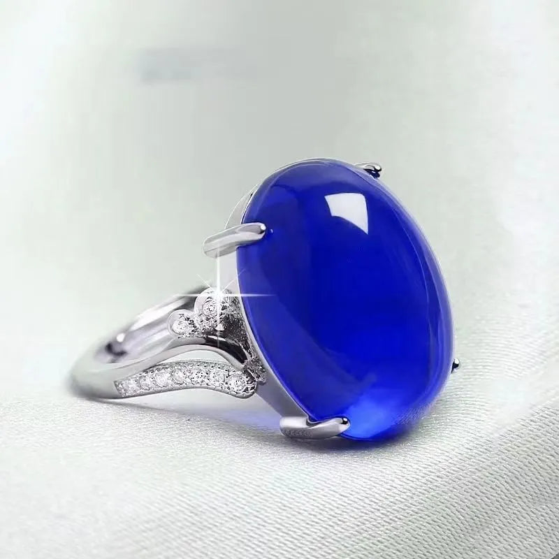 Adjustable geometric alloy ring in ethnic style, shown in black, blue, green, red, and yellow colours.
