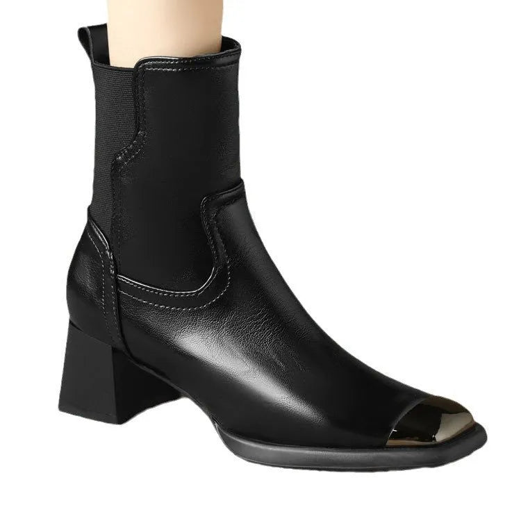 Brown high-heel Martin ankle boots with side zip and metal decoration on cowhide leather.