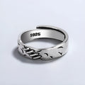 Black geometric adjustable copper ring with oval elements for women's fashion jewellery