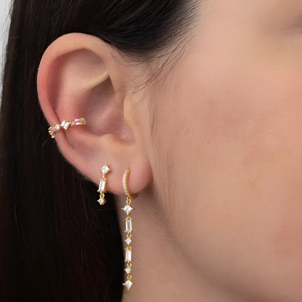Geometric U-shaped ear clips with colourful zircon detailing in gold and white variations