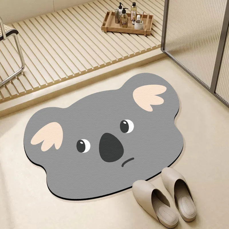 Diatomite absorbent bathroom mat with cartoon animal design in one of three available sizes