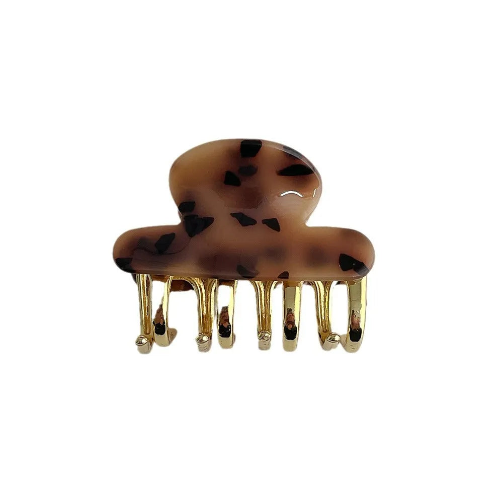 Women's retro acetate barrettes with metal grip in four colour variations including leopard print