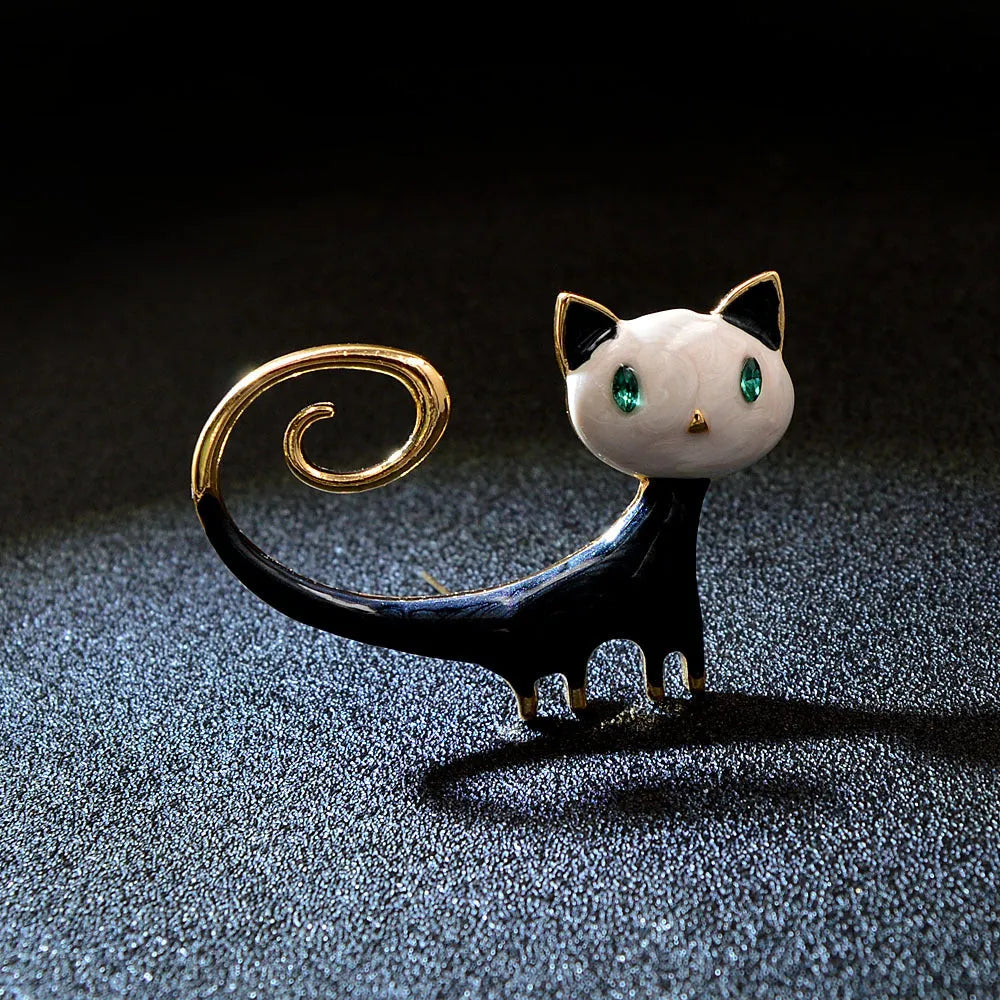 Personalised painted cat tail brooch in orange or white colour with alloy metal construction