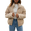 Women's apricot corduroy jacket with stand collar and front zip, showing textured fabric detail