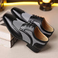 Men's black houndstooth plaid casual canvas shoes with lace-up front and rubber sole.