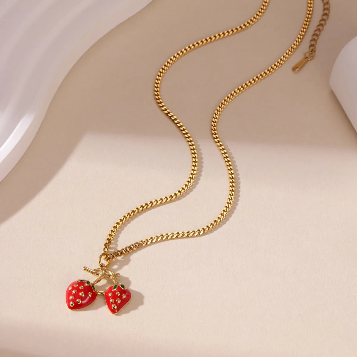 Stainless steel strawberry pendant necklace with alloy chain in red and white gradient colours