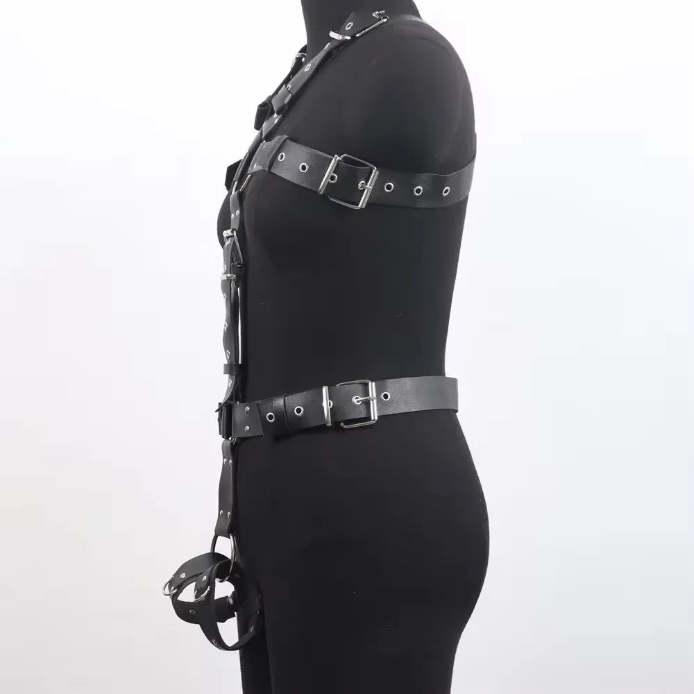 Black patent leather waist cincher shapewear with pin buckle fastening on mannequin