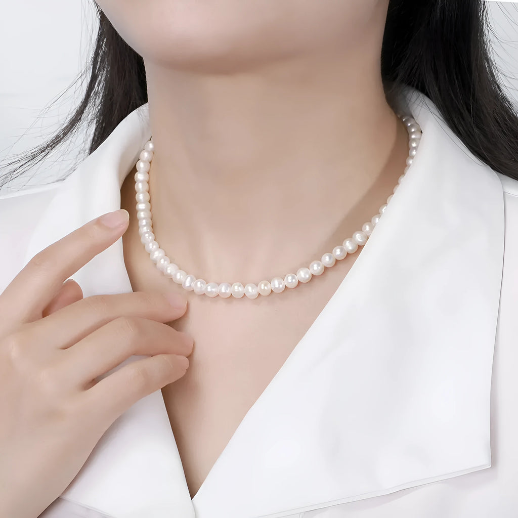 Women's adjustable necklace with freshwater pearls on sterling silver chain