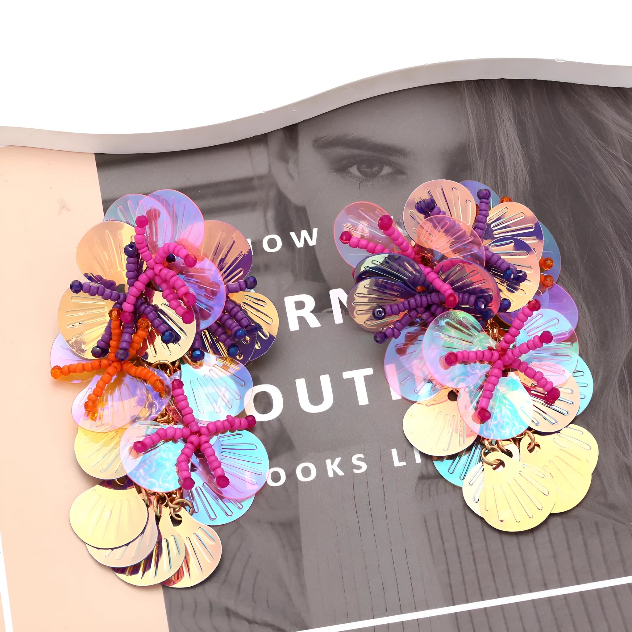 Handmade multicoloured string bead flower and leaf earrings in exaggerated dopamine style.